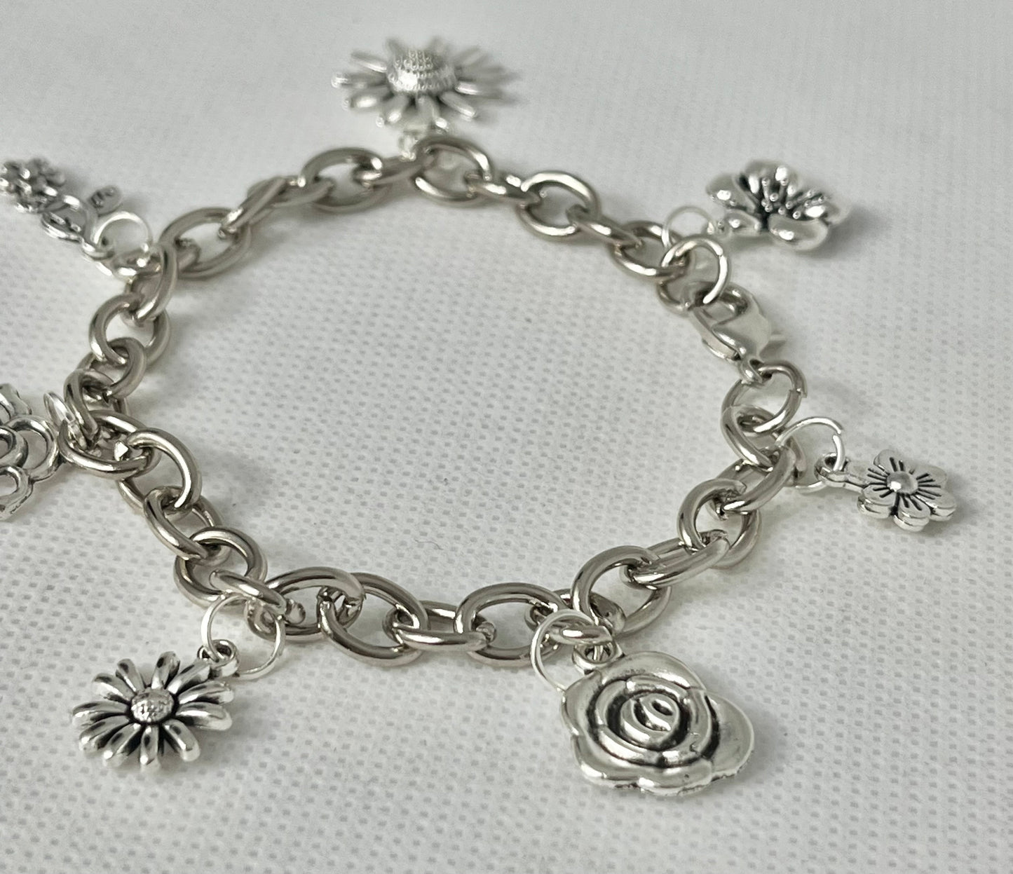 Silver floral charm bracelet