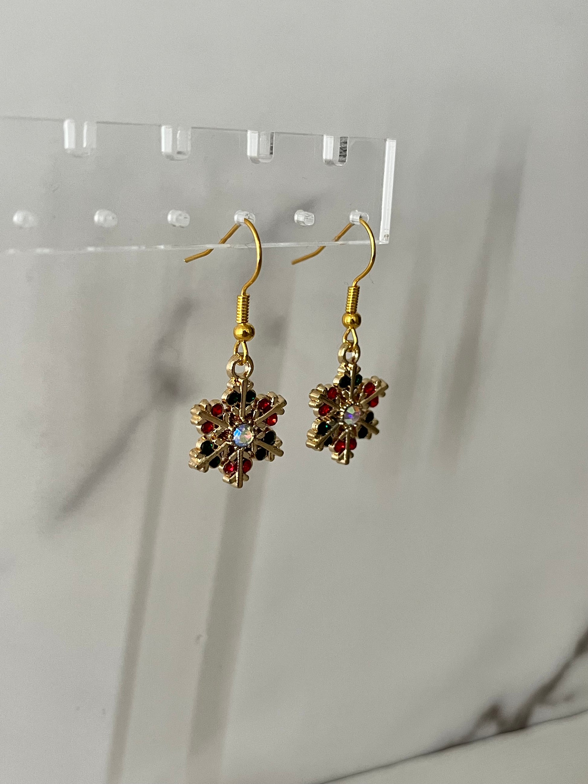 Christmas jeweled snowflake gold earrings