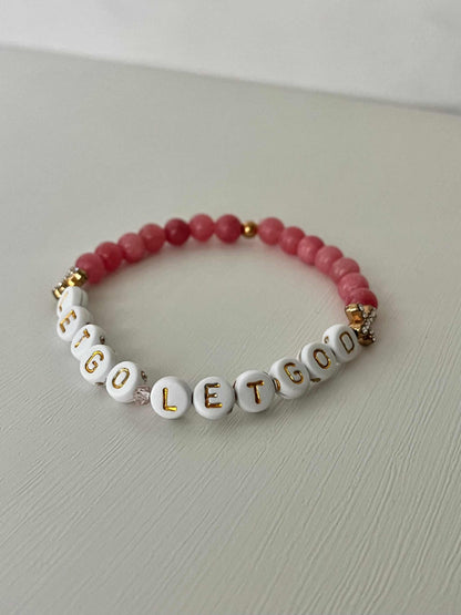 Let Go Let God Bracelet with pink glass marbled beads and gold crosses