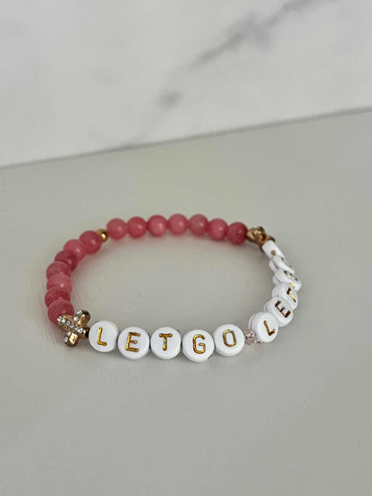 Let Go Let God Bracelet with pink glass marbled beads and gold crosses