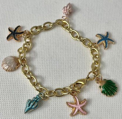 Gold ocean beach charm bracelet