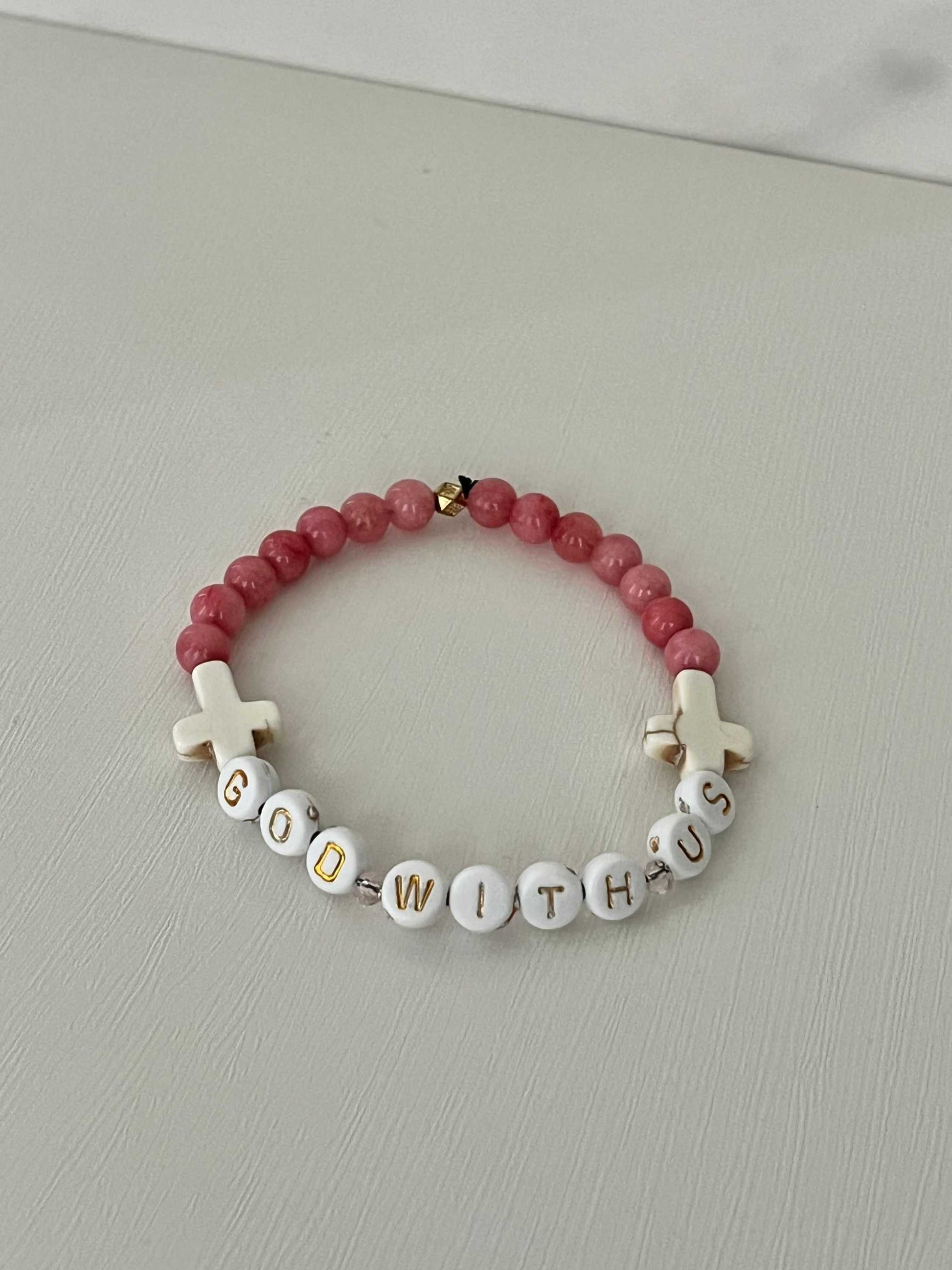 GOD WITH US pink marble beads bracelet, handmaPink Marble God With Us Bracelet showcasing elegant pink marble beads and a charm, ideal for adding a touch of faith-inspired style to your collection.de bracelet, womens bracelet, bracelet for women, stretch bracelet, stone bracelet