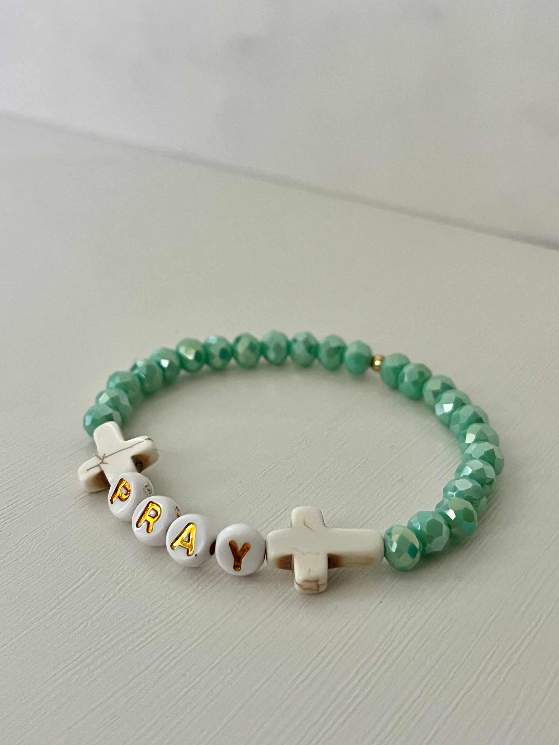 PRAY Mint Faceted Beaded Bracelet showcasing vibrant mint beads, perfect for expressing faith and adding a touch of elegance to your jewelry collection.