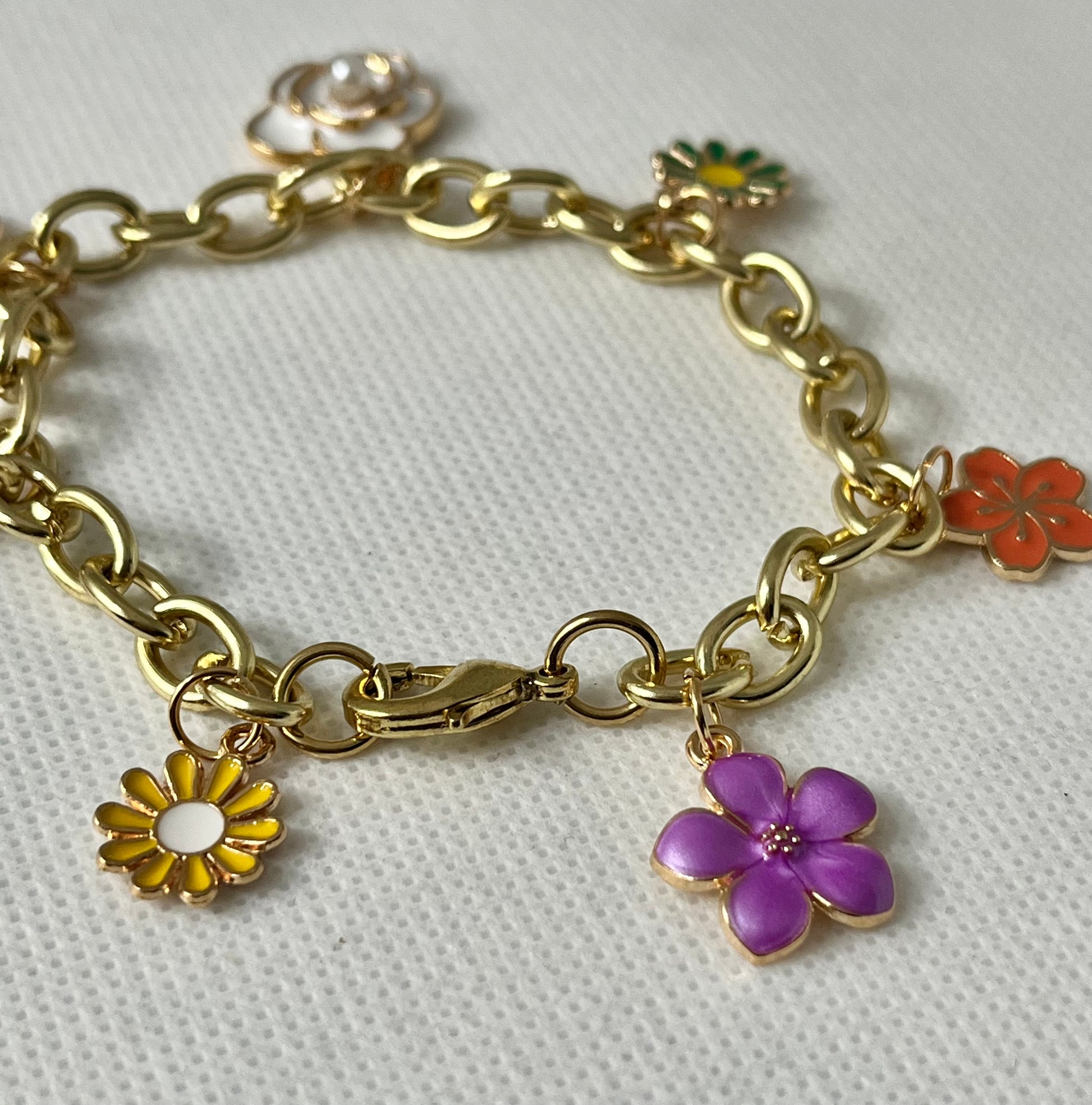 Gold floral charm bracelet