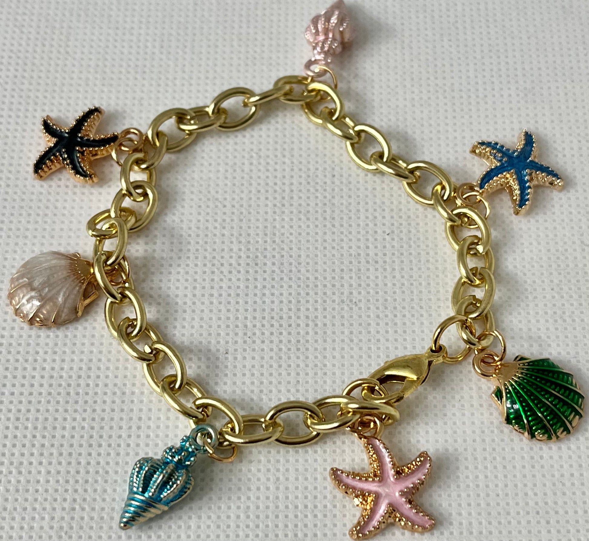 Gold ocean beach charm bracelet