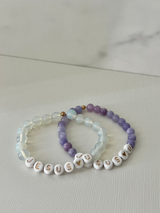 Jesus Loves U clear/purple marble bracelet multiple colors