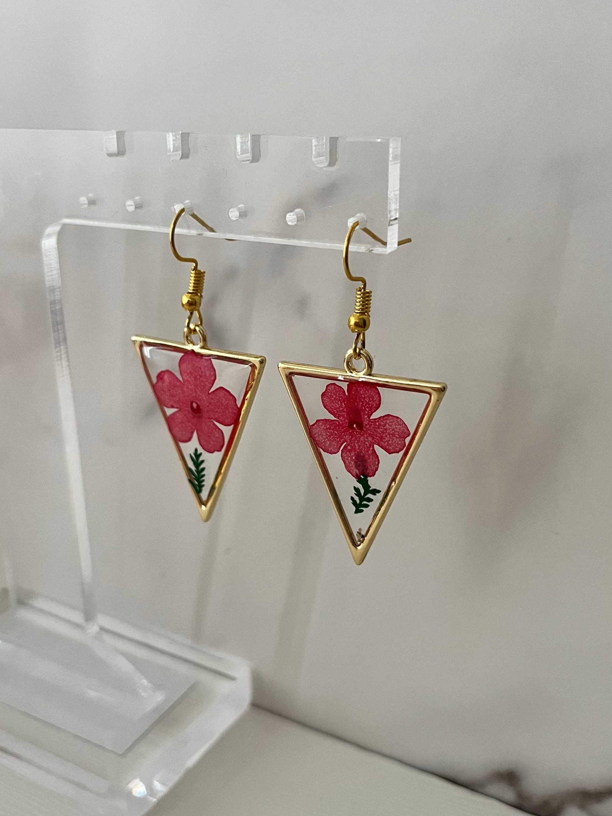 Gold triangle earrings with dried flower accents