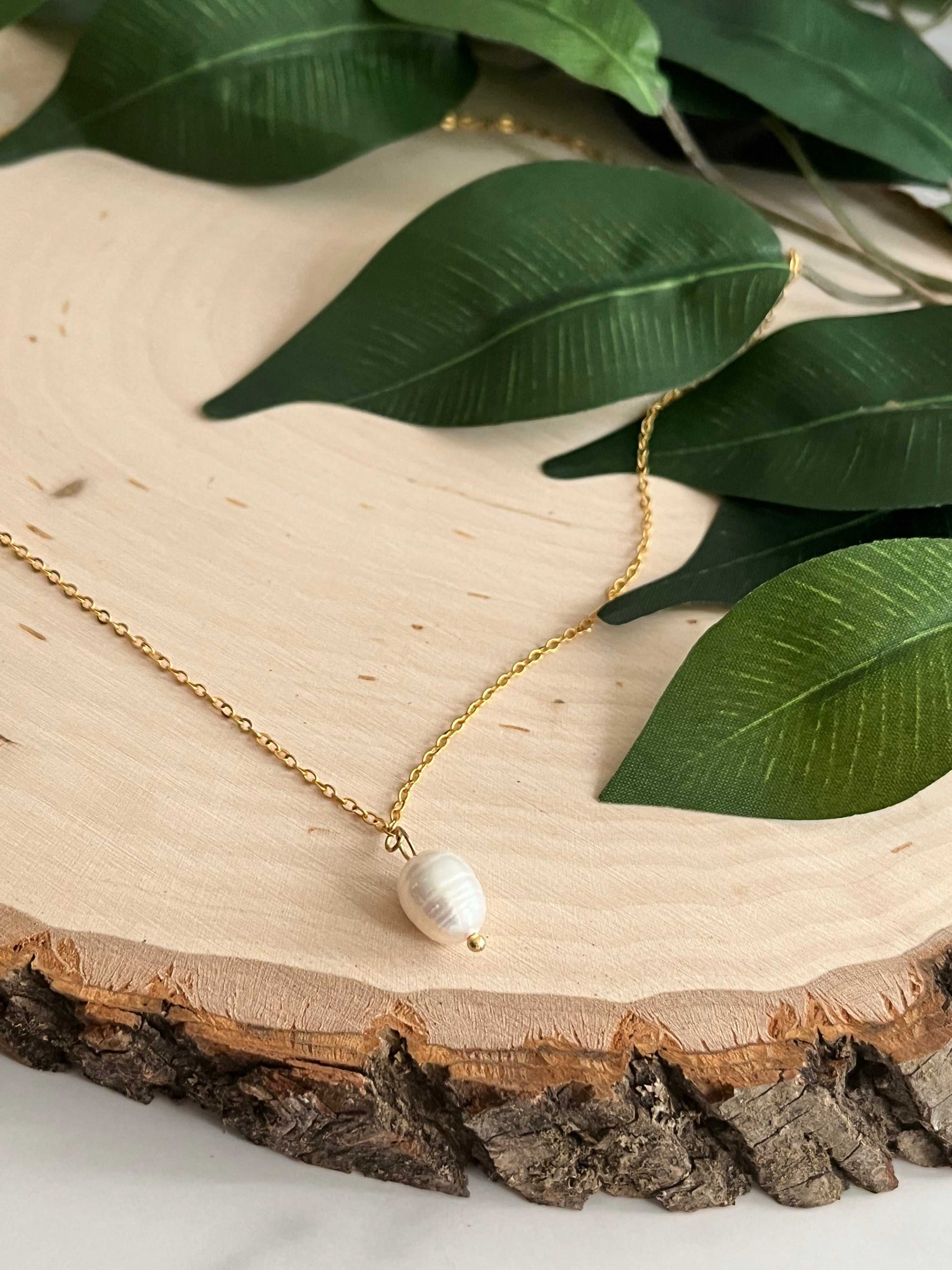 Gold necklace with pearl pendant, inspired by Proverbs 31 for Christian women.