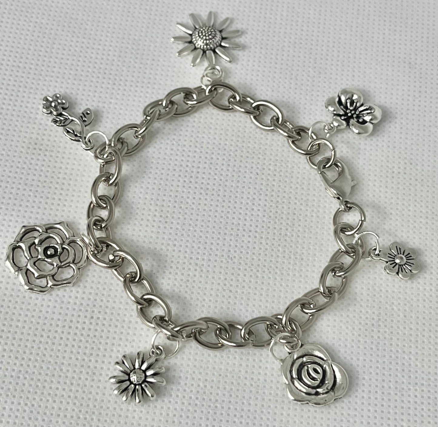 Silver floral charm bracelet