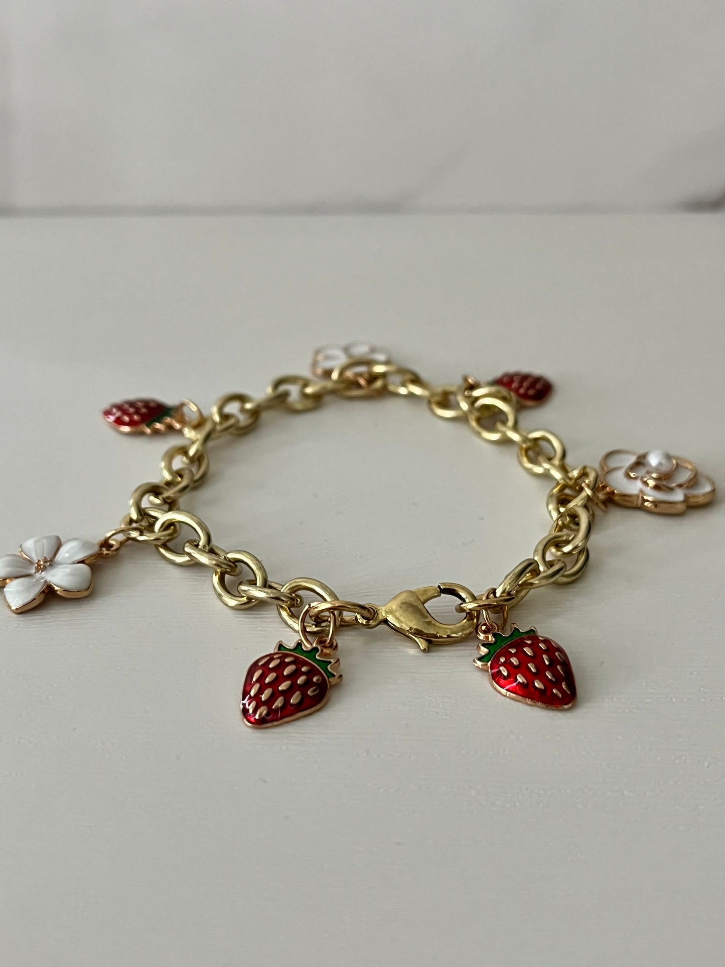 Gold strawberry floral charm bracelet