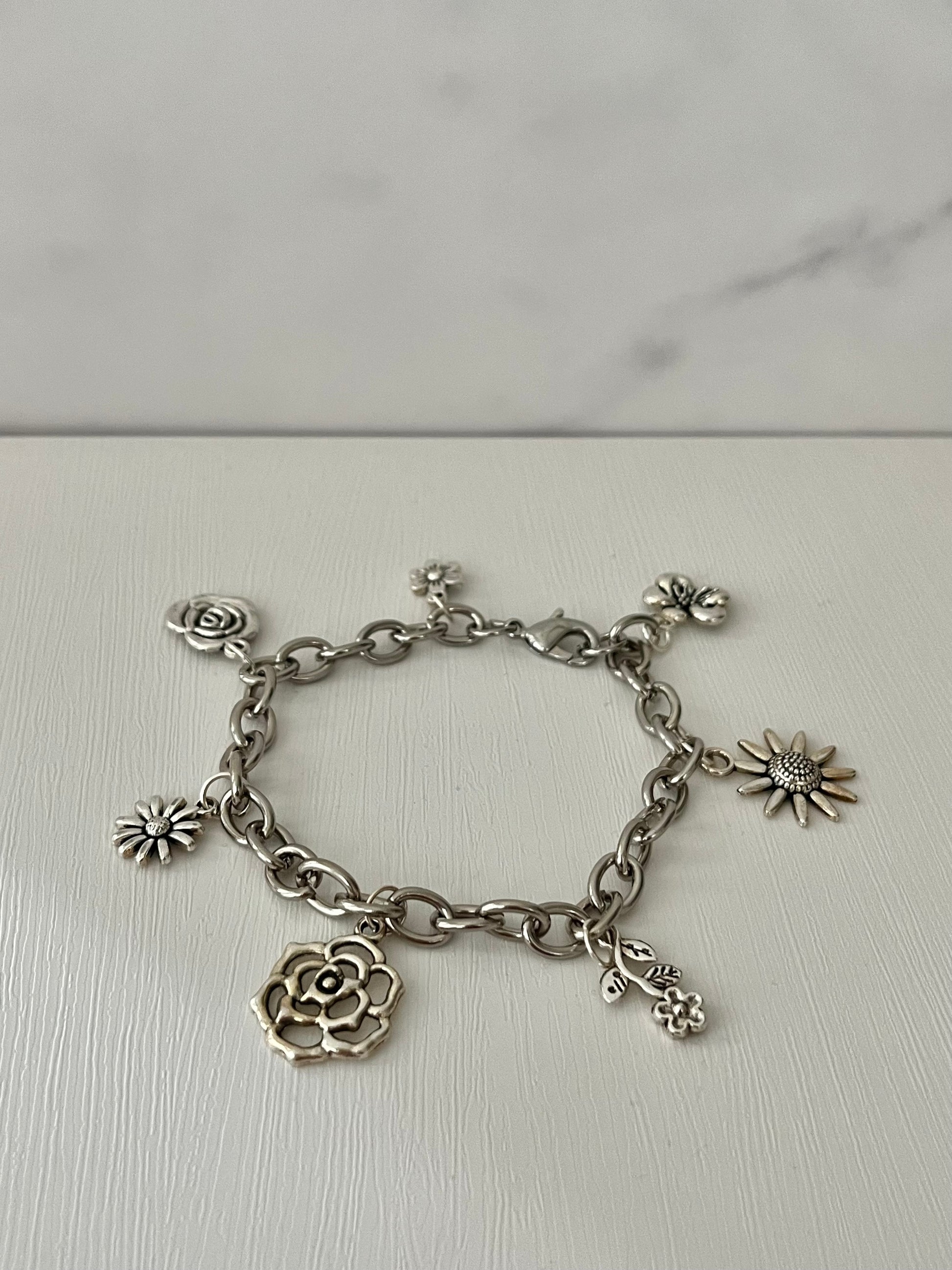 Silver floral charm bracelet