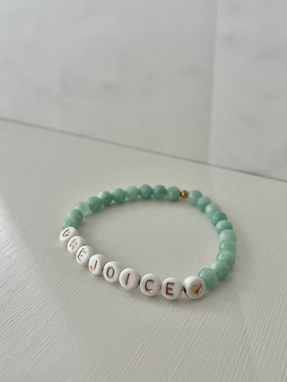 Rejoice Green Jade Bracelet showcasing beautiful green jade stones, ideal for expressing faith and adding a touch of elegance to your jewelry collection.