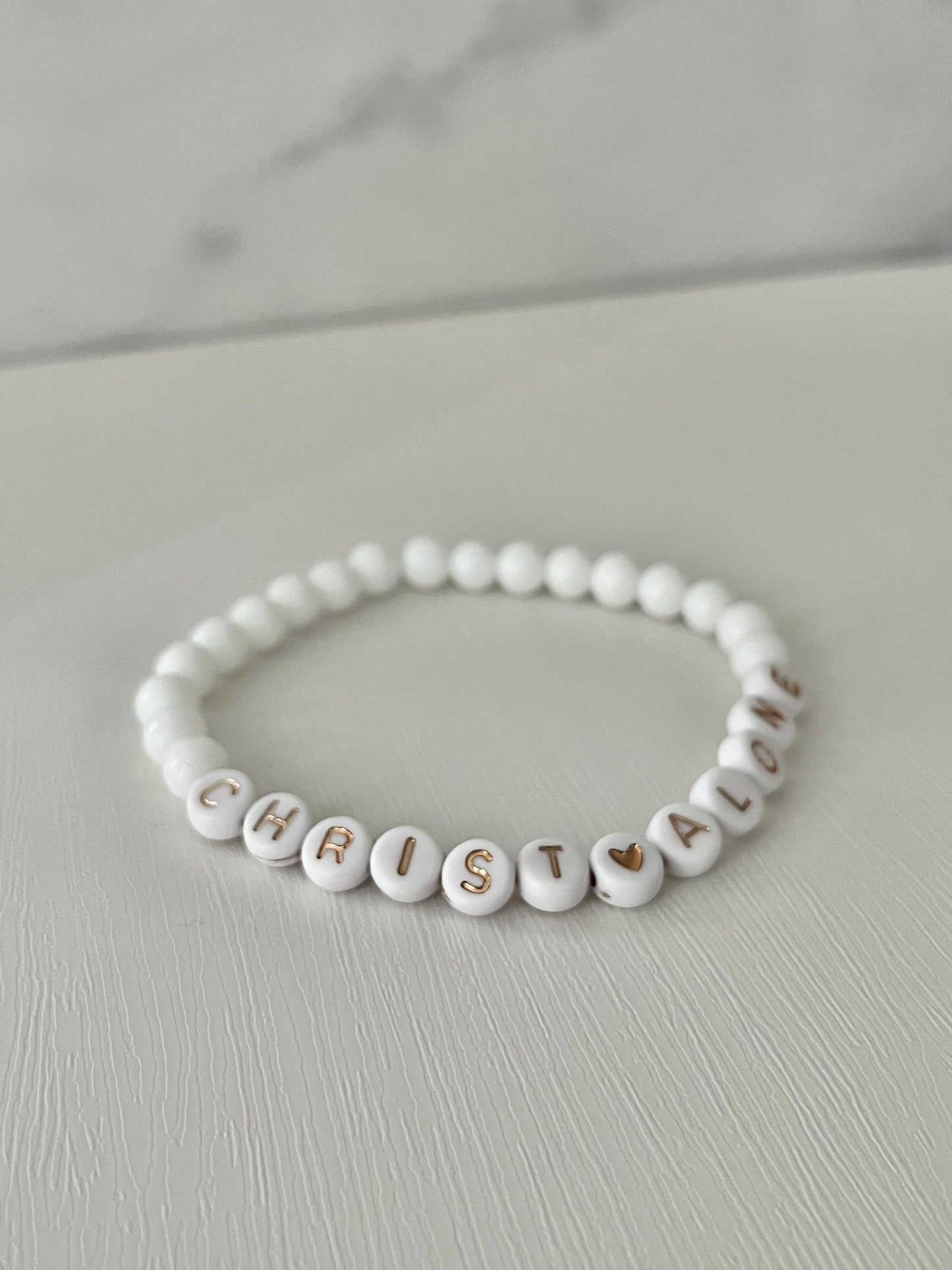 Christ Alone white stone or peach faceted beaded bracelet