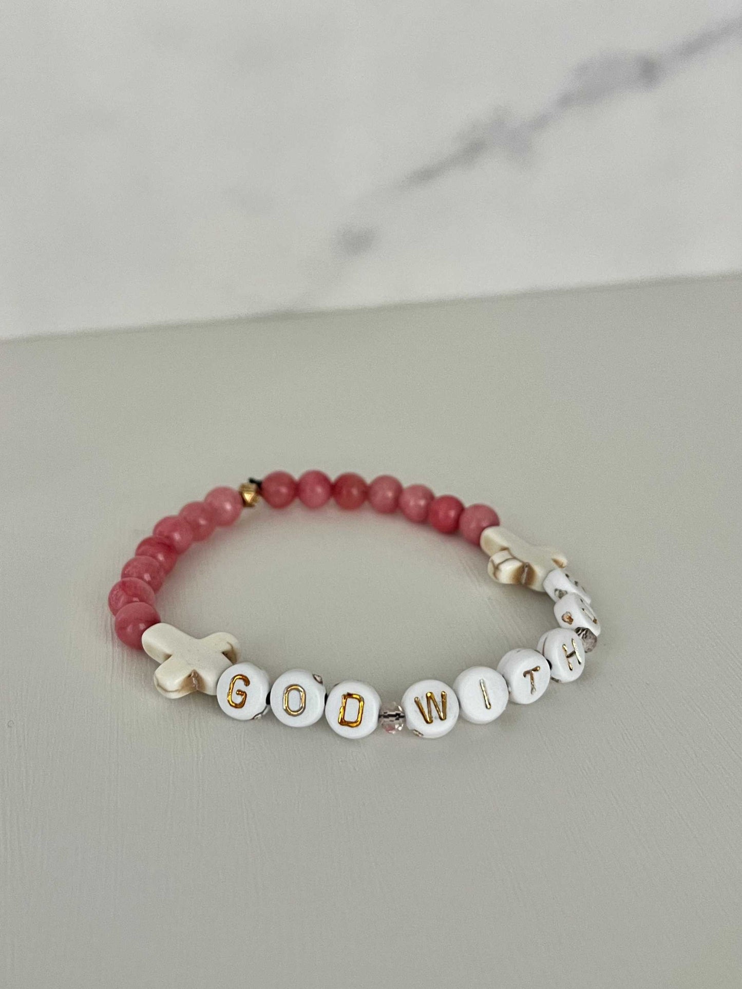 GOD WITH US pink marble beads bracelet,Pink Marble God With Us Bracelet showcasing elegant pink marble beads and a charm, ideal for adding a touch of faith-inspired style to your collection. handmade bracelet, womens bracelet, bracelet for women, stretch bracelet, stone bracelet