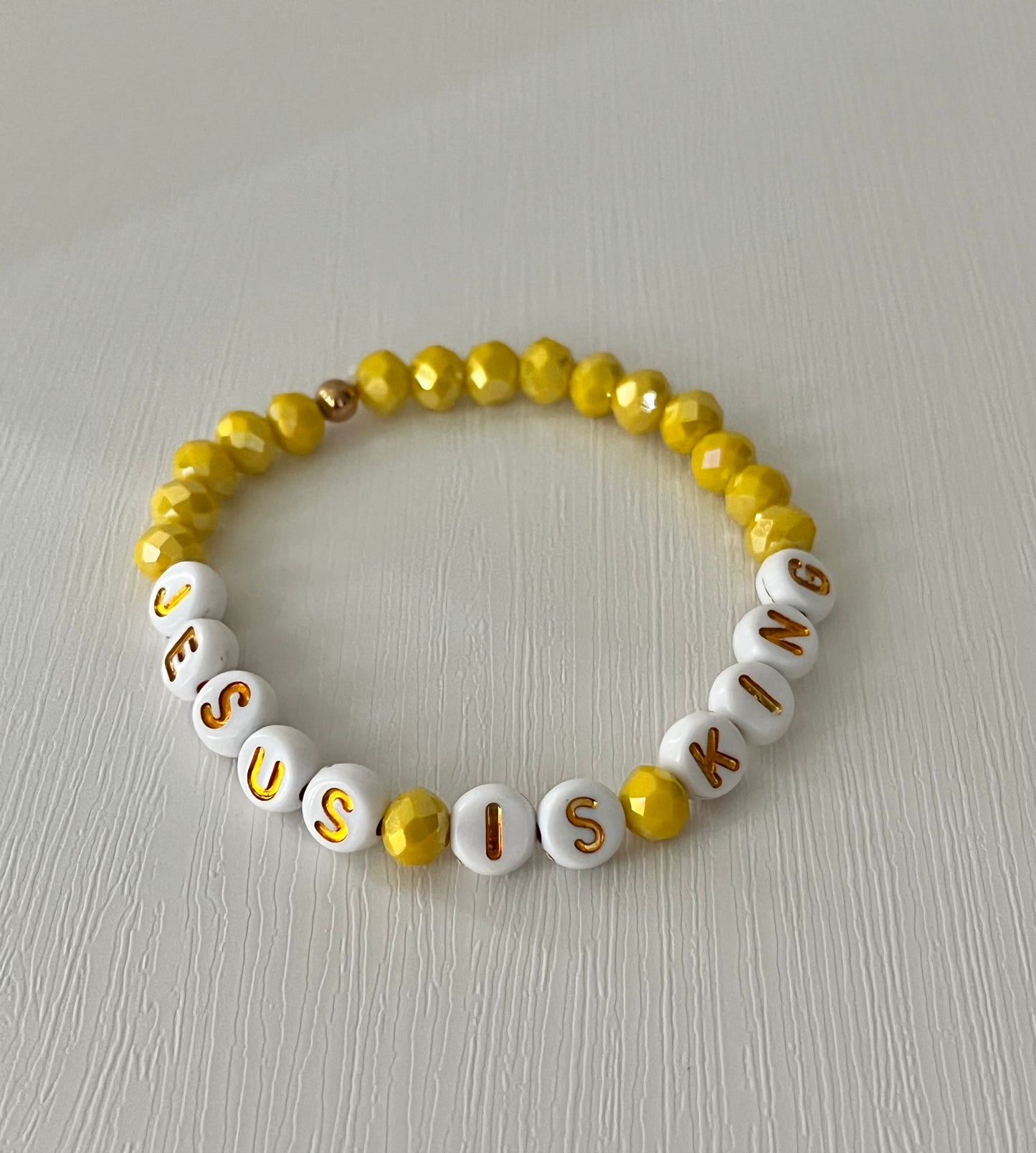 Jesus Is King Yellow glass faceted bead bracelet