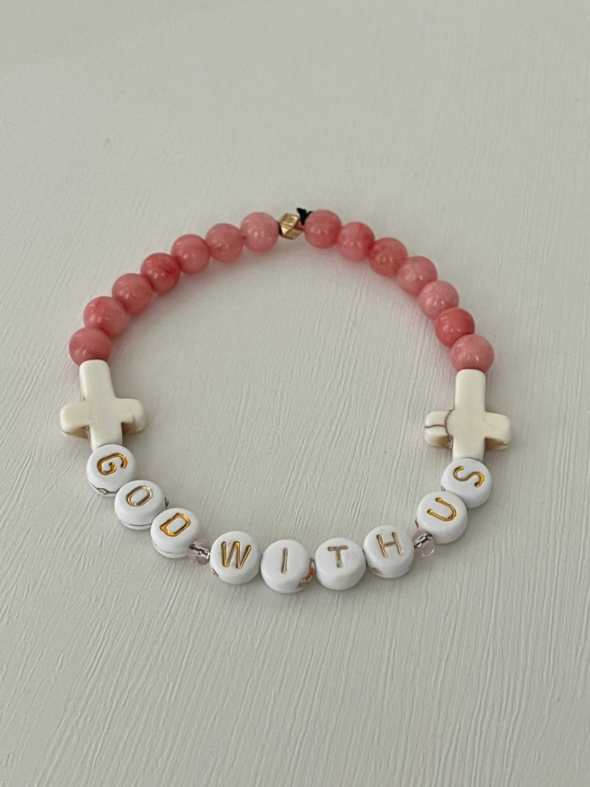 GOD WITH US pink marble beads bracelet, handmade bracPink Marble God With Us Bracelet showcasing elegant pink marble beads and a charm, ideal for adding a touch of faith-inspired style to your collection.elet, womens bracelet, bracelet for women, stretch bracelet, stone bracelet