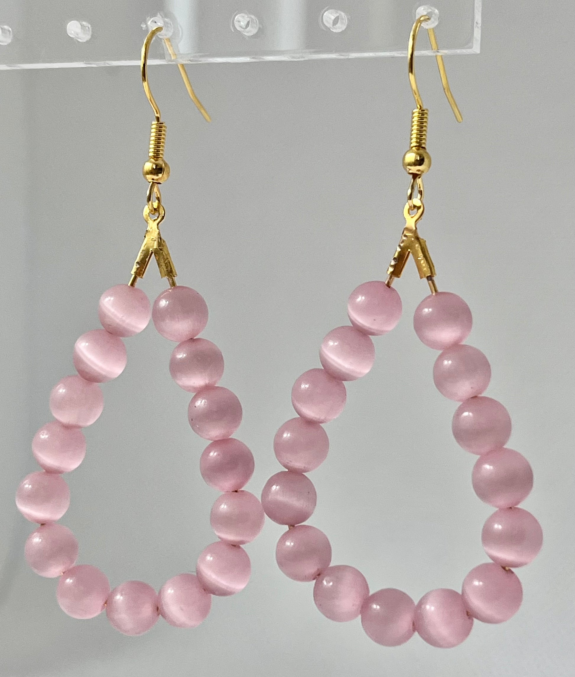 Pink cat’s eye opal gold drop earrings