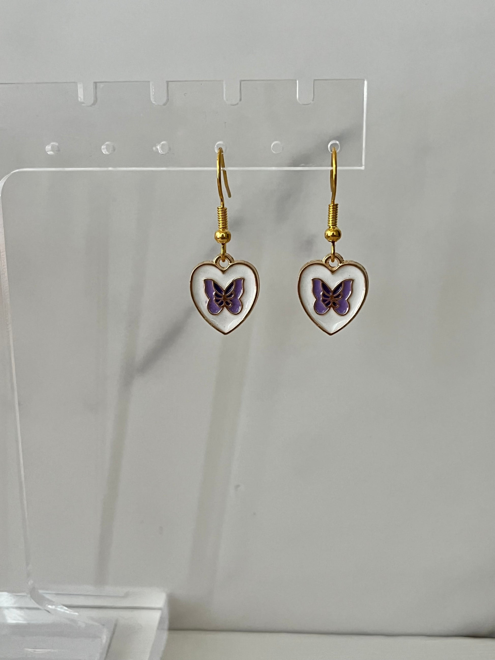 Gold heart shaped purple butterfly earrings