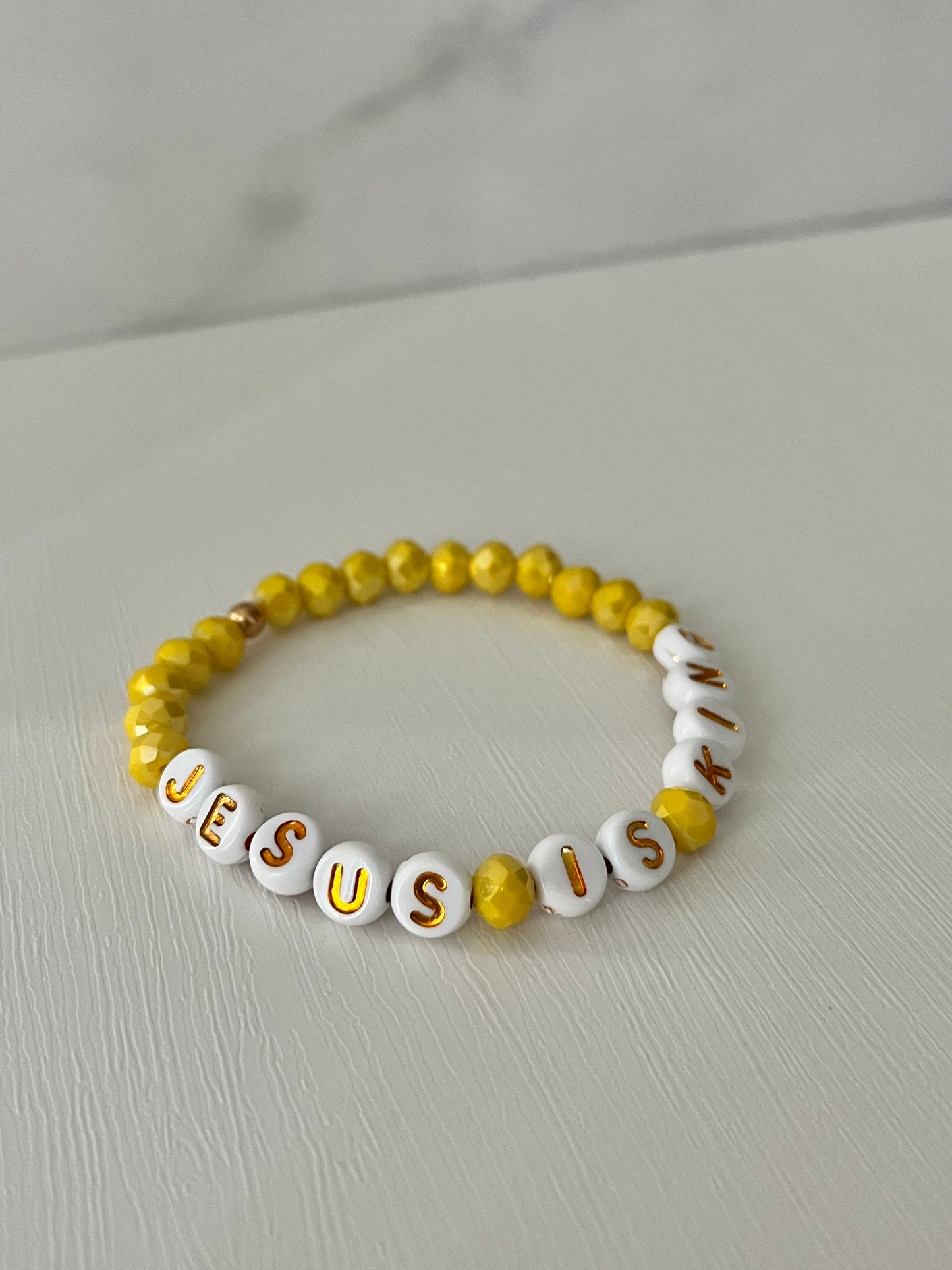 Jesus Is King Yellow glass faceted bead bracelet