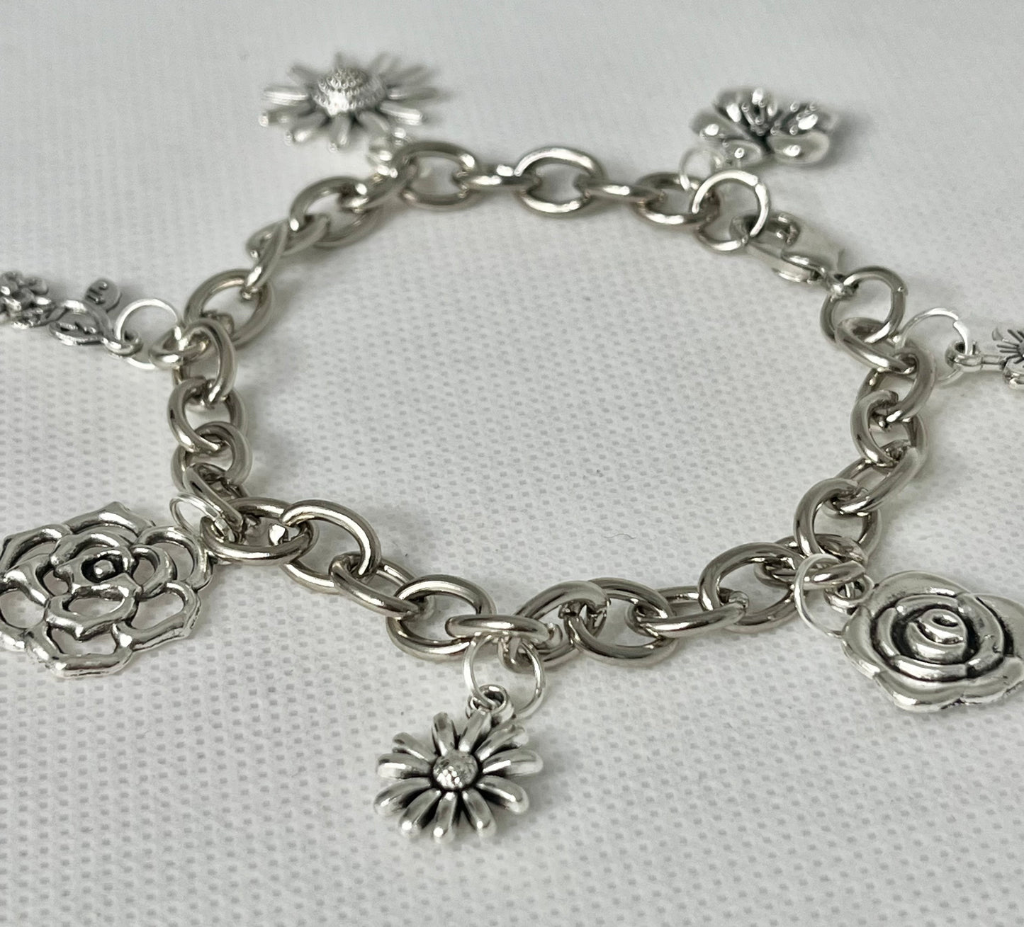 Silver floral charm bracelet