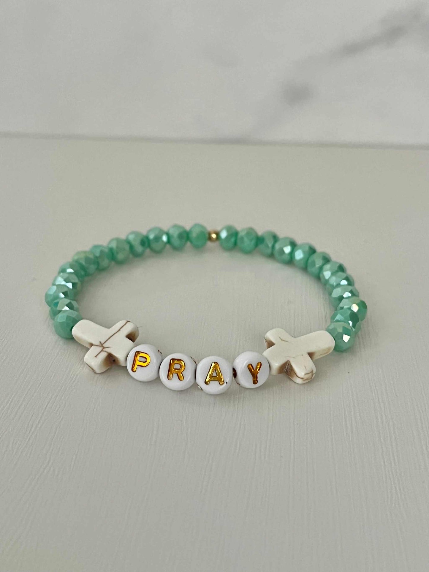 PRAY Mint Faceted Beaded Bracelet showcasing vibrant mint beads, perfect for expressing faith and adding a touch of elegance to your jewelry collection.