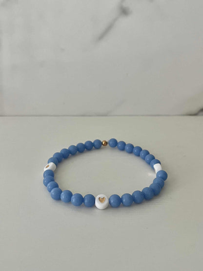 Periwinkle Gold Heart Bead Bracelet – pastel bead bracelet with gold heart.

