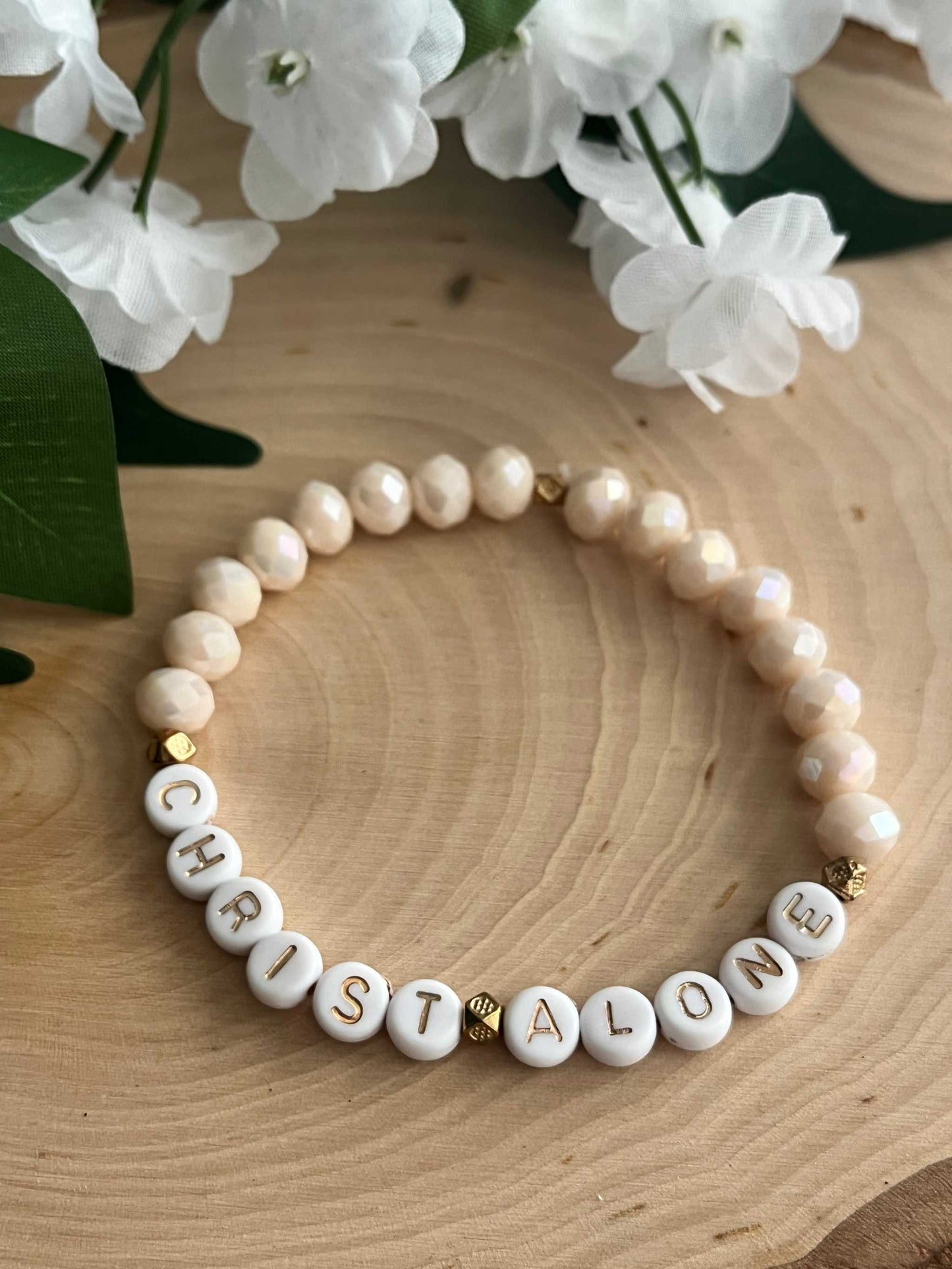 Christ Alone Peach Bead Bracelet, handmade Christian jewelry with peach beads, faith-inspired accessory.