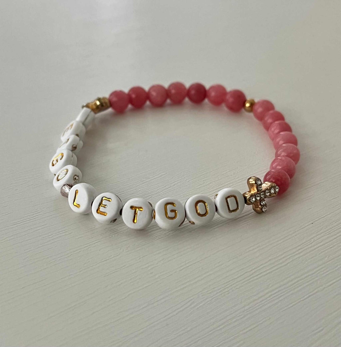 Let Go Let God Bracelet with pink glass marbled beads and gold crosses