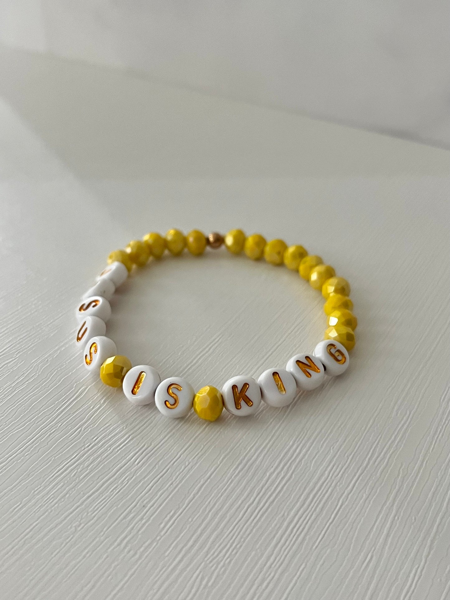 Jesus Is King Yellow glass faceted bead bracelet