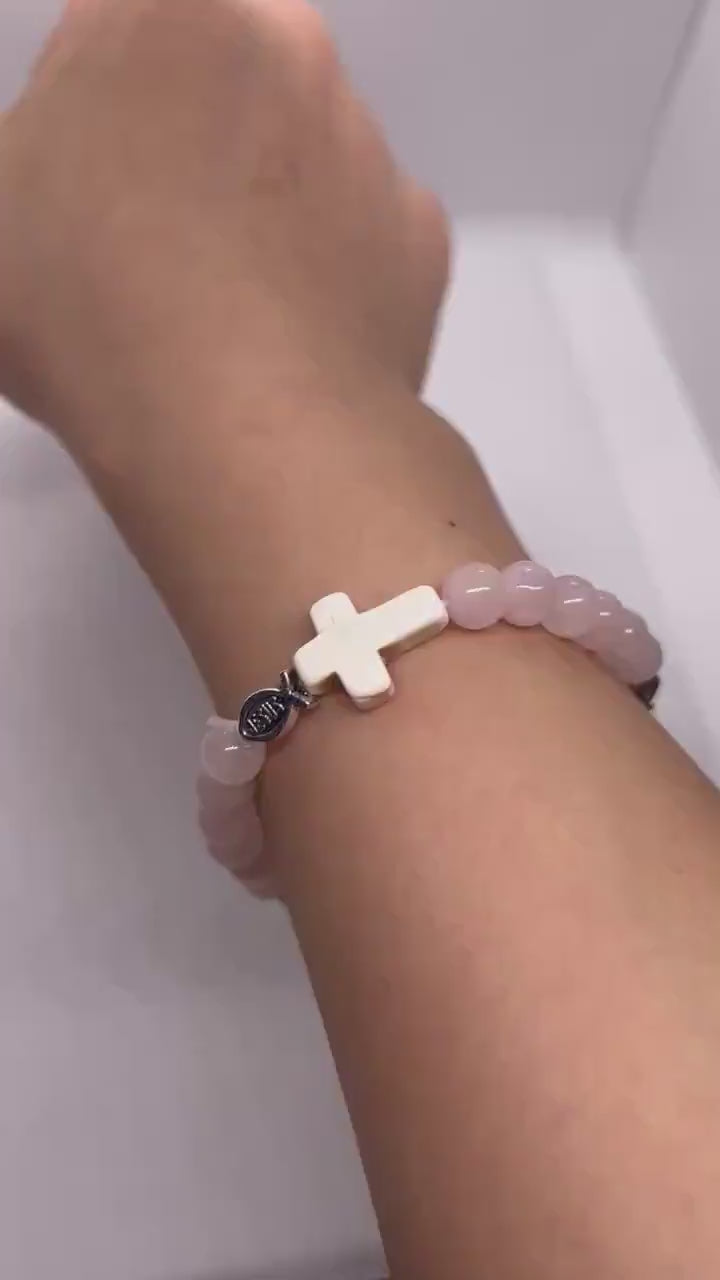 Rose quartz stone bead bracelet with Christian Jesus fish and cross charms